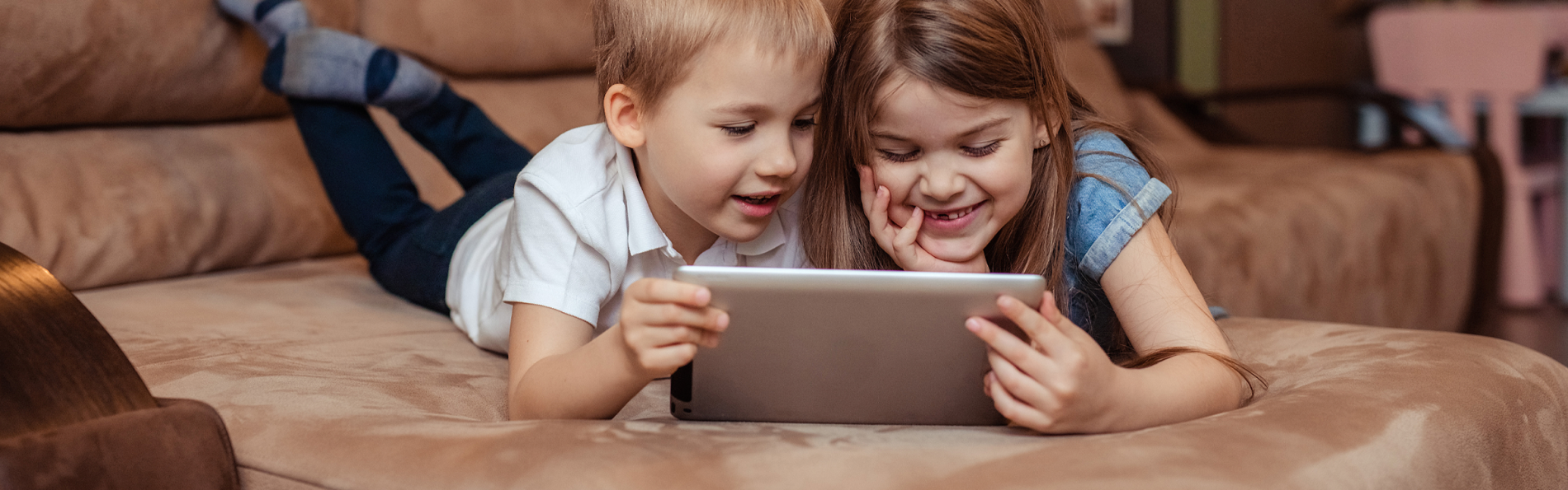 brother-sister-using-tablet